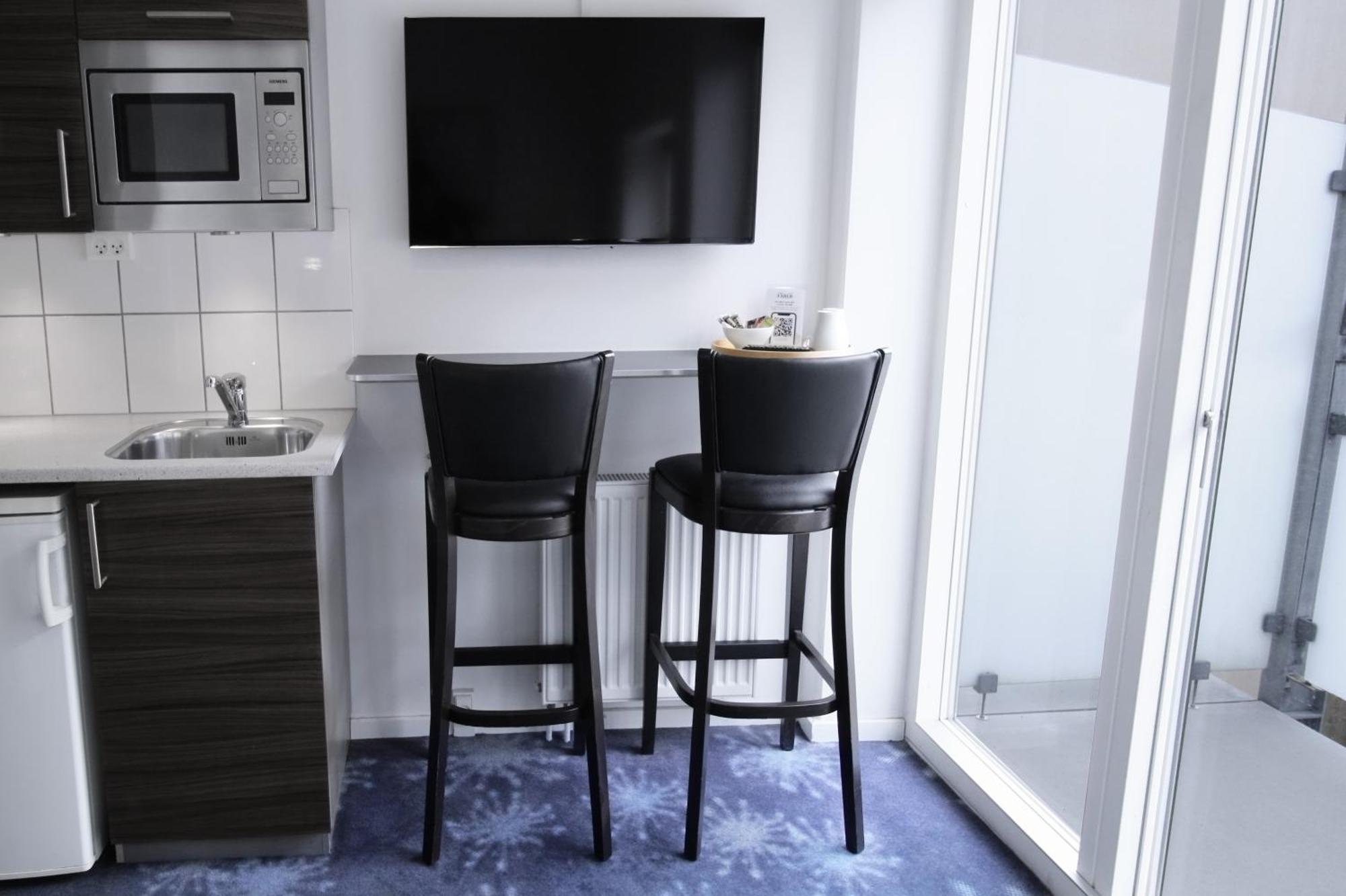Aparthotel Faber ออร์ฮูช ภายนอก รูปภาพ